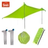 Sun Shelter and Ultralight Lycra Tent with Sandbags in Beach