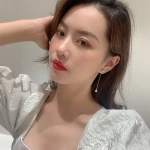 Web celebrity asymmetrical string colored diamond ball ball pearl stud earrings with a three-piece back hanging earring