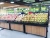 Import Wooden movable fruit and vegetable display supermarket shelf from China