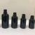 Import Hengjian 5ml 10ml 15ml 20ml 30ml 50ml 100ml shiny black glass roller bottle roll on ball essential oil perfume bottle with cap from China