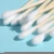 Import High Quality cotton swab steril single head long  bamboo stick medical cotton bud swabs from China