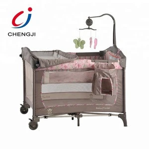 High quality electric baby bed swing baby crib with rattles
