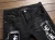 Import In Stock New American Style black color men skinny tiger embroidered jeans from China