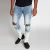 Import Mens jeans 2021 skinny fitting whiskering bleach wash stretch denim jeans with distressing knee and zipper ankle from China