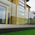 Side mounted u channel for frameless glass balcony railing