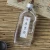 Import Wholesale Different shape Miniature 250ml Flat Flask Glass Liqueur Wine Bottle For Whisky Rum Gin from China