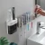 Import 2021 hot sale automatic toothpaste dispenser wall-mounted no punching with 4pcs cup and 4pcs Toothbrush Holder from China