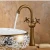 Import Antique Brass Deck Mounted Bathroom Sink Mixer Tap Dual Handle Washbasin Faucets from China