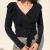 Import Autumn winter deep V-neck knitted sweater with belt for women from China