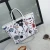 Import Custom women trendy cross shoulder hand bags stylish casual print leather big tote purses and handbags from China