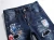 Import embroidered label jeans mens stretch slim-fitting pants spring new hole patch trendy mens long pants from China