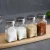 Import Empty Square Jar Airtight Clear Stickers Pour Sift Shaker Spice Bottles Glass Pepper Mile Bottle with Adjustable Hole from China