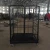 Import High Quality Four-Wheel Rolling Container Electrostatic Spraying Anti-Corrosion Collapsible Mesh Coil Metal Cage from China