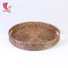 Round rattan wicker flat food serving tray, wicker serveware with cut-out handle, rattan fruit basket wholesale