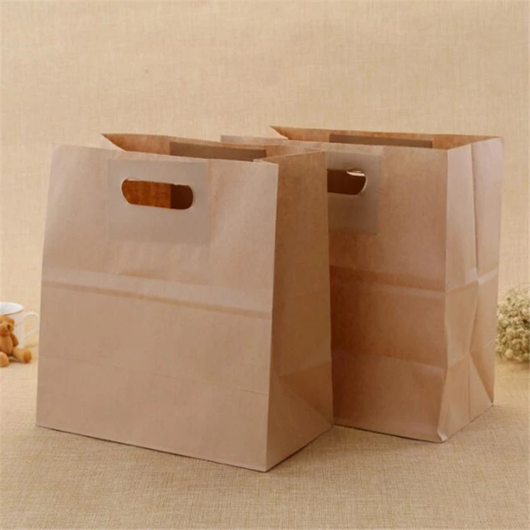 Wholesale cheap kraft paper takeaway die cut handle paper bag from china source factory supplier manufacturer