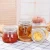 Import Wholesale clear lead-free glass storage bottles & jars for tea/ honey/ enzymes/ coarse cereals from China