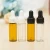 Import color coating surface handing mini glass vial 2ml 3ml 5ml 8ml 10ml 15ml 20ml 25ml 30ml small glass bottle with rubber from China