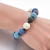 Import Colorful Lava Healing Balance Beads Reiki Bracelet Handmade Rope Bracelet for woman from China