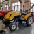 Import Dongfeng 30-40Hp Universal 4WD Four Wheel Farm Agricultural Diesel Engine Tractor from China