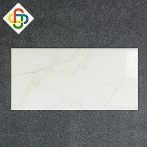foshan supplier living room full body carrara white marble tiles  600x1200 jazz white marble looking ceramic tiles