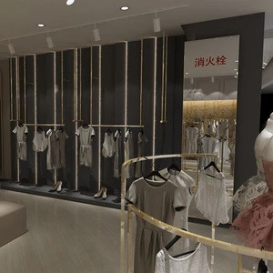 Hanging Dress Display Rack Women Clothes Shop Showroom Interior Design