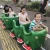Import Hot-sale  Amusement Kids Playing GiantWorm Electric Green Train from China