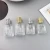 Import Luxury glass perfume spray pump bottles with gold lid clear perfumes cosmetic container 30ml perfume bottles from China