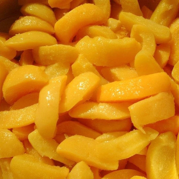Original and healthy fruit canned yellow peach in syrup
