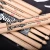 Import Percussion Instruments Natural Color Teardrop Wood Tip Drum Sticks 5A from China