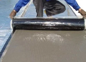 Reactive adhesive polymer wet paving waterproof membrane