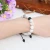Import 2020 Valentine&#39;s Day Hot Seller Lava Rock Howlite Stone Black Onyx Tiger Eye Braided Rope Bracelet for Couple Christmas Gift from China