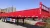 Import CIMC HUAJUN 40tons tipper truck trailer heavy duty long distances transport side dump semi trailer from China