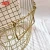 Import factory supply Large Round gold metal wire iron mesh storage  bin laundry basket with handle from China