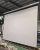Import high gain large cinema wall mount ceiling electric projector screen motorized 150 motorized projector screen from China