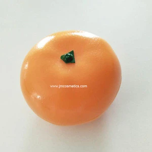 Make your own brand ball shape lip balm / lip gloss with fruit shape packaging made by GMP factory