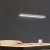 Import Modern Long Strip Lamp with Adjustable Cord Hanging Lamp for Office Commercial Area Study Room Simple Linear LED Pendant Light from China