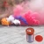 Import 2 minutes wholesale price rainbow colorful handheld smoke bomb flare fireworks for sale from China