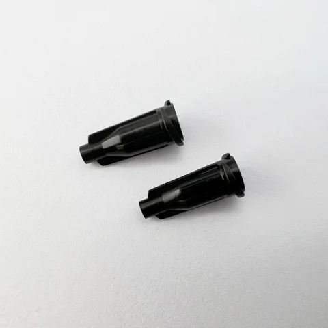 Black syringe head plug