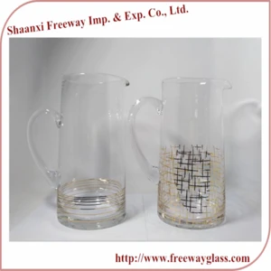 clear glass water pitcher with flamingo design