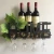 Import Decorative Black Home Wall Mounted Hanging Metal Wine Bottle Rack Holder with 4 Glass Holder & Wine Cork Storage from China