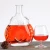 Import High quality 700ml bell shape glass wine bottle XO brandy bottle wholesale from China