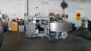 Industrial ice cream cone making machine on other food processing machine