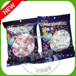 pink and white flower and cylinder shape marshmallow cotton candy
