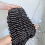 Premium Quality Soft Deep Wave Long Lasting Hair Extensions Hot Sale Raw Hair Bundles Curly Human Hair Wig Full Frontal Weaves