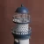 Import unique design metal crafts nautical style Iron lighthouse LED light for home decoration from China