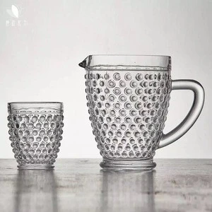 Wholesale cheap embossed drinking glass water pitcher with handle