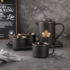 Wholesale luxury golden leaf frosted matte glazed black ceramic coffee tea set with tray