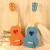 Import Cheap price string musical instrument basswood practice kids guitar ukulele from China