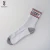 Import Custom Men Outdoor Knitted Cotton Sports Basketball Sock White Plain Athletic Socks from China