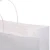 Import Customised logo print white kraft paper shopping bags with handle from China